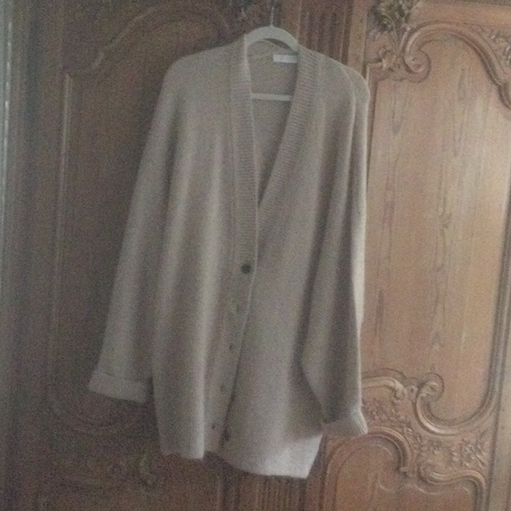 Oversized wool cardigan. Reverse pleat in back. Dropped shoulder ovrtsized